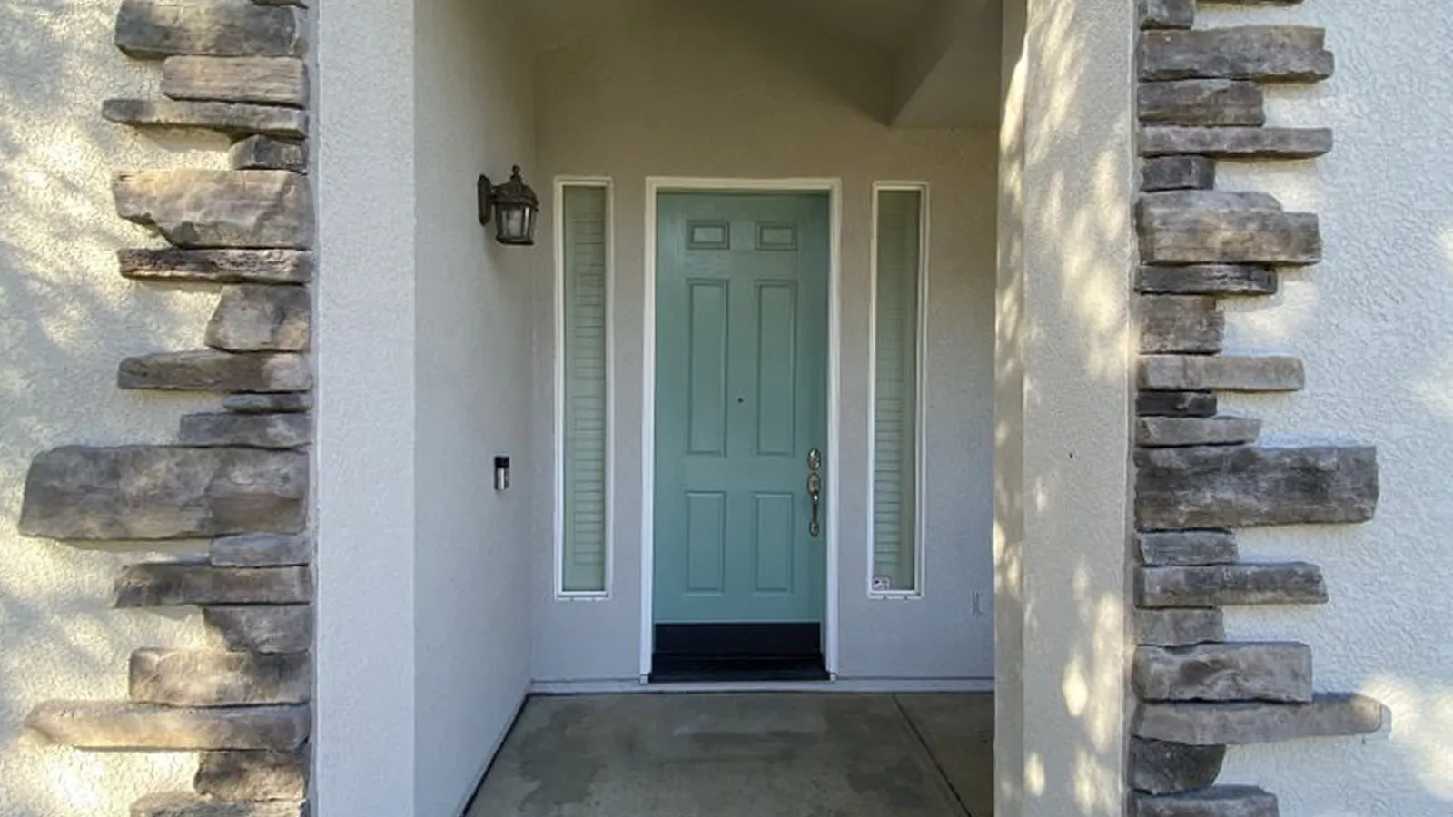 Vibrant exterior door painting by Plata Painting company